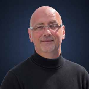 Porträt von Ralf Musto, systemischer Coach und Hypnotherapeut.